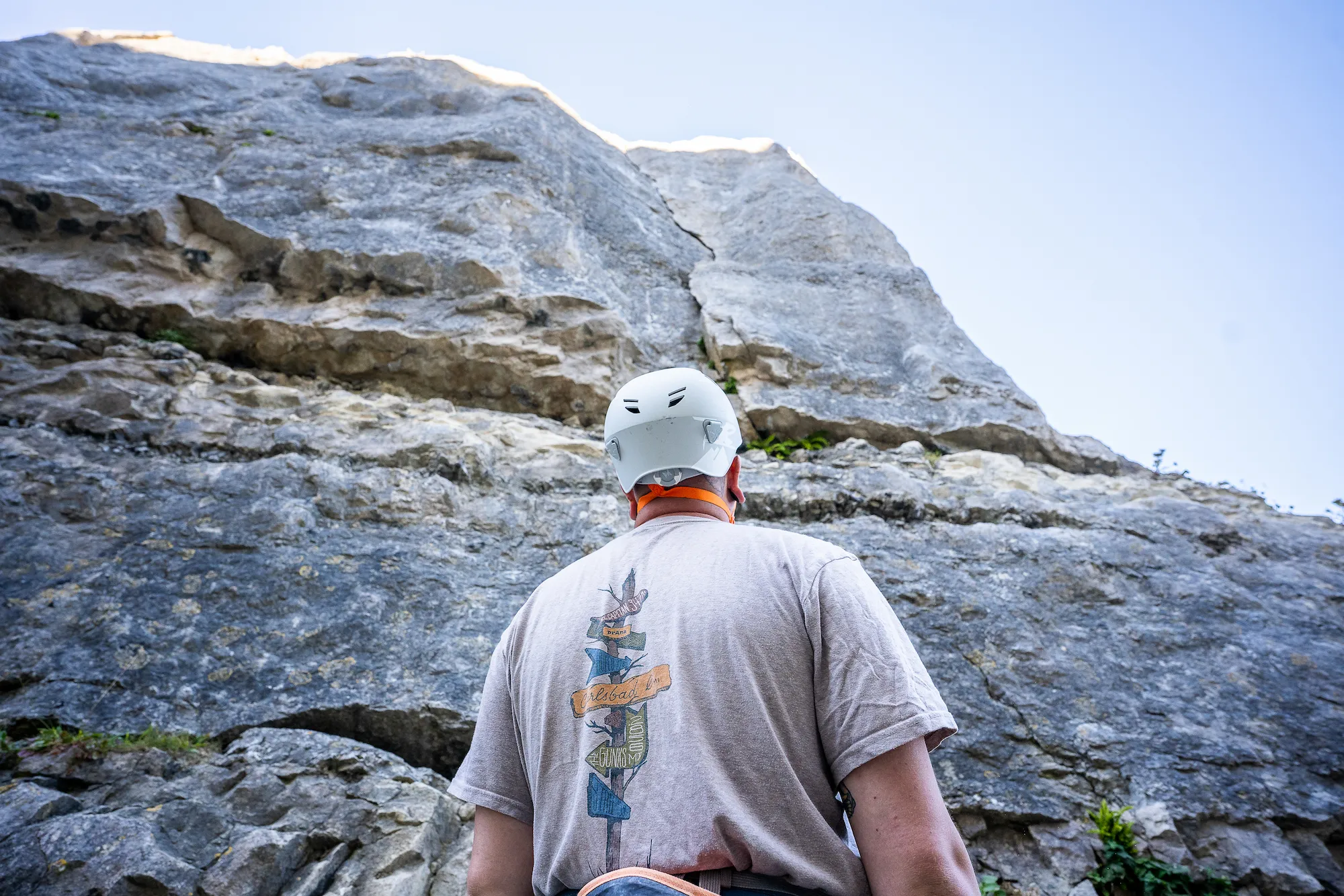 Hayden belaying from the bottom of the rock